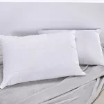 Set x2 almohadas + protector 144 hilos
